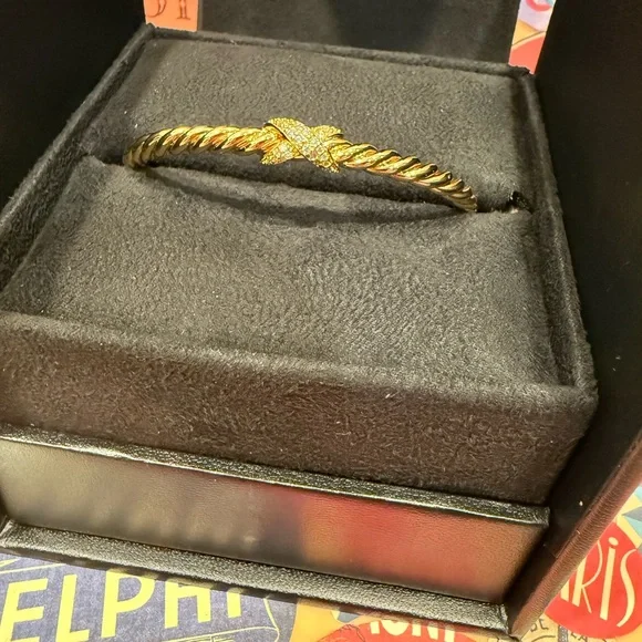 18m Gold Plated Twisted Bracelet with Simulated Diamond X Accents .